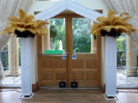 art decor archway with feathers