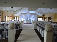 grecian backdrop with ceiling drape rose ball columns
