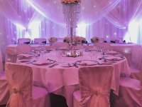 Crystal-waterfall-centrepiece-with-floral-top-and-Grecian-starlight