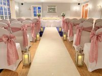 ceremony-belmont-with-aisle-carpet-and-lanterns