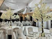 white-taffeta-and-blossom-tree-centrepieces